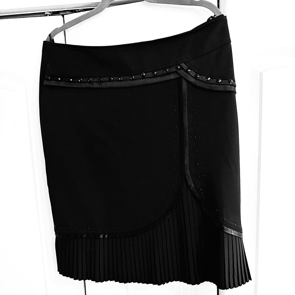Chic Black Skirt with Pleated Hem